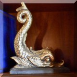 D25. Dolphin bookend. 